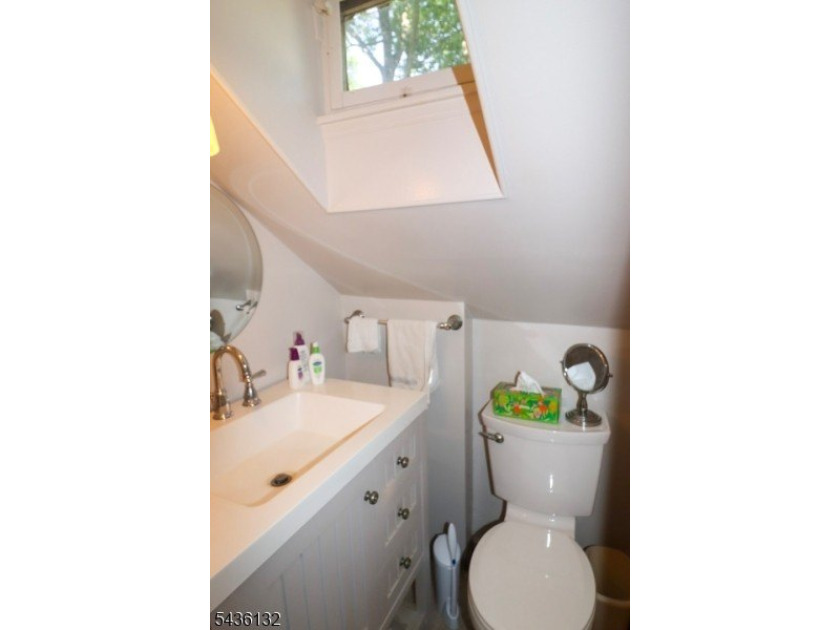 Charming custom-built Cape Cod home nestled on a prime corner - photo 15