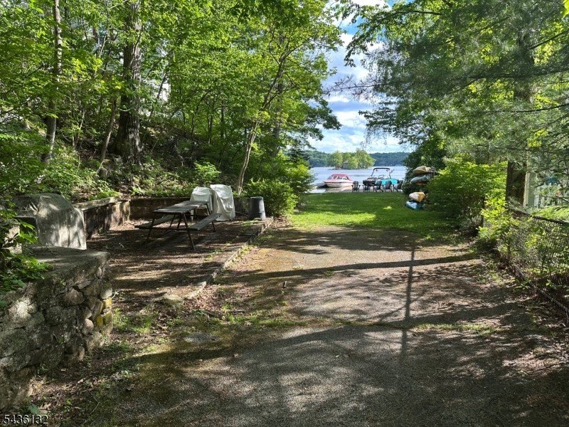 Charming custom-built Cape Cod home nestled on a prime corner - photo 23