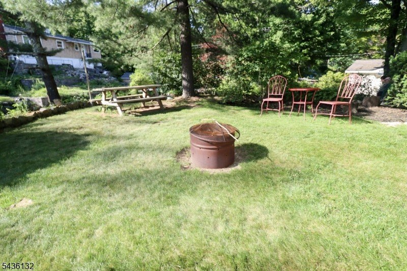 Charming custom-built Cape Cod home nestled on a prime corner - photo 25