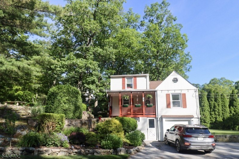 Charming custom-built Cape Cod home nestled on a prime corner - photo 34