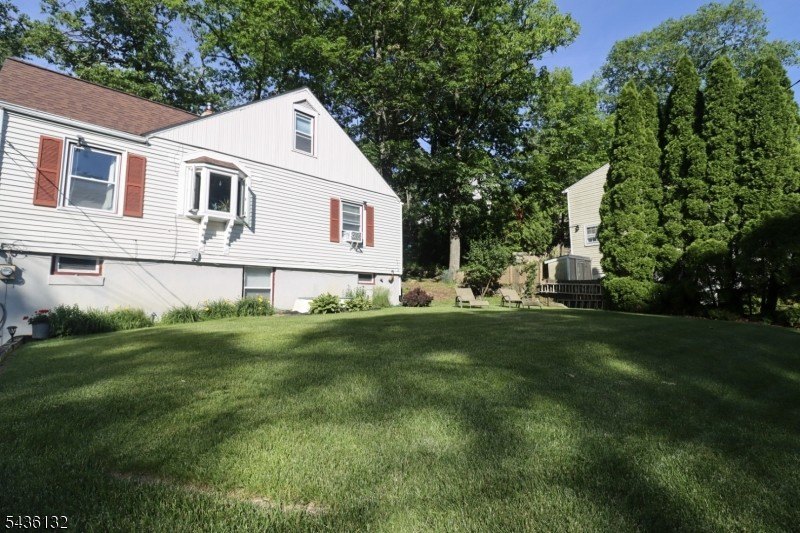 Charming custom-built Cape Cod home nestled on a prime corner - photo 35