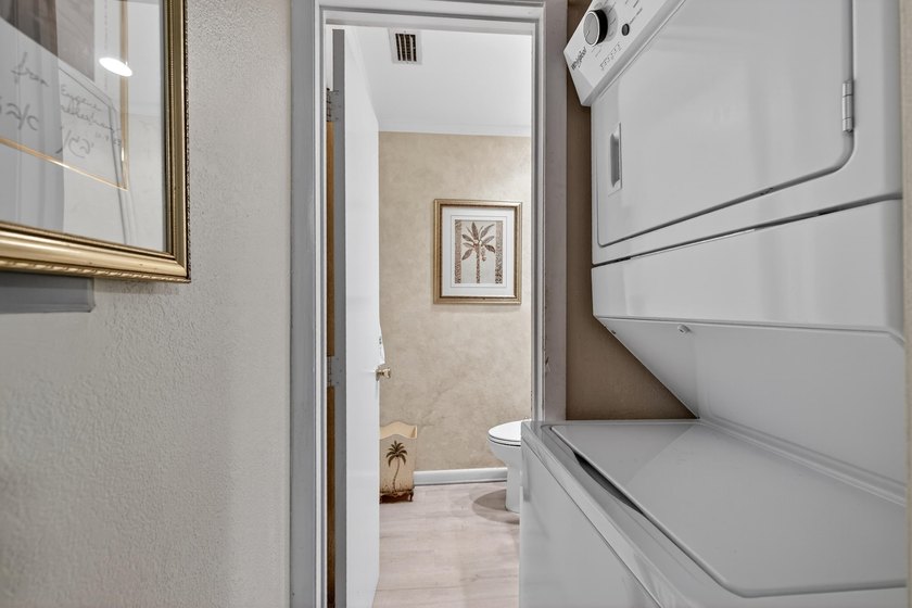 Charming 2 bed | 2.5 bath, 2-story townhouse offering a - photo 6