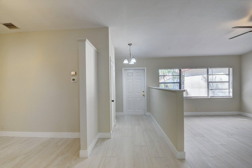 Discover this beautifully renovated 4-bedroom, 2-bathroom - photo 5