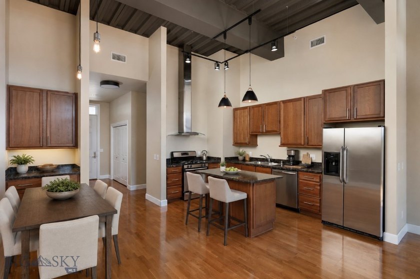 Perched on the fourth floor of Village Downtown, this - photo 4