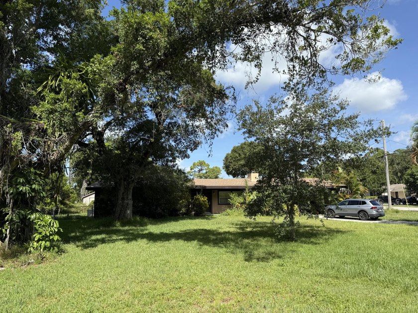 This Centrally located Fort Pierce Home sits on larger corner - photo 3