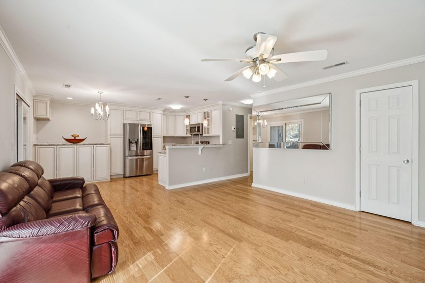 This first floor condo in a gated community with tons of - photo 8