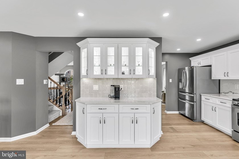 Welcome to this beautifully maintained end-unit townhome in the - photo 9