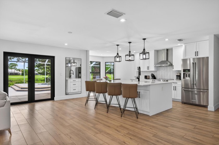 Welcome to this exceptional luxury pool estate in one of - photo 16