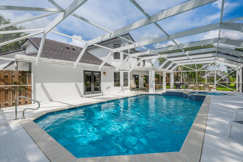 Welcome to this exceptional luxury pool estate in one of - photo 26