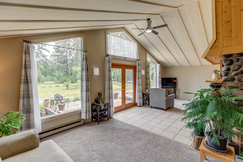 Towering mature pine trees on 5 private acres, this beautiful - photo 5