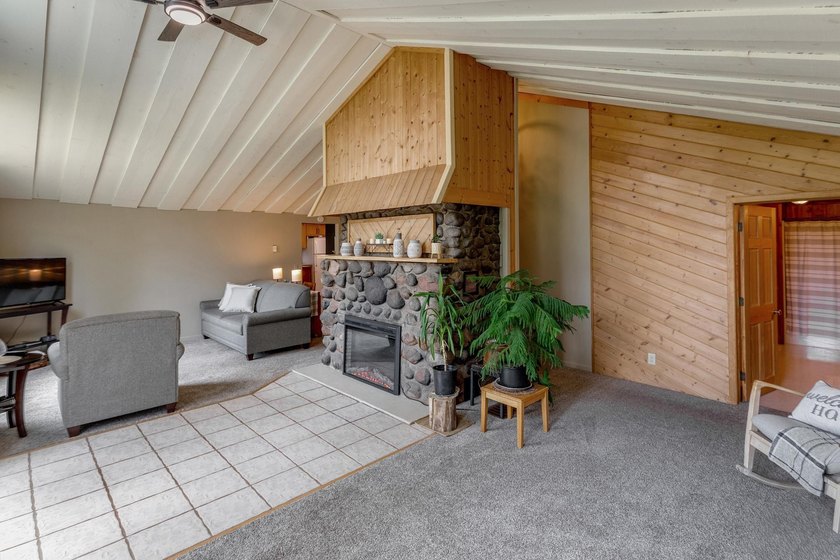 Towering mature pine trees on 5 private acres, this beautiful - photo 6