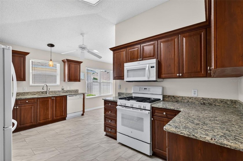 BOND PAID!! NO CARPET in This 3BR, 2BA ANNA MARIA COURTYARD - photo 8