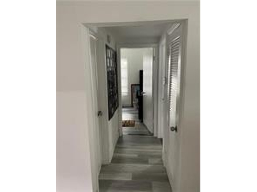 FIRST-FLOOR CORNER UNIT! Bright 2-bedroom, 1-bath on the first - photo 9