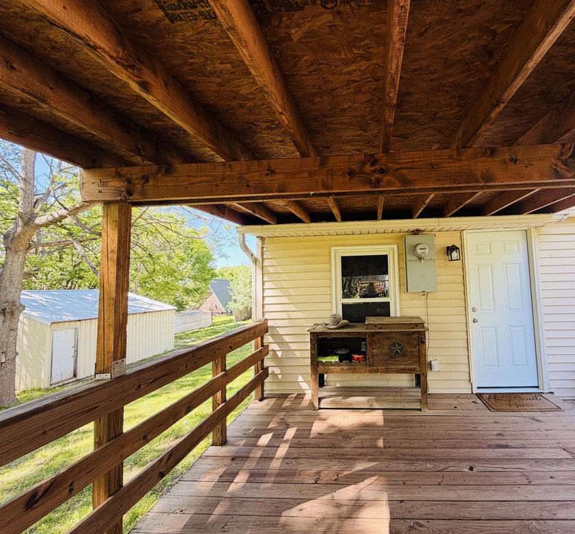 Completely remodeled and move-in ready, this quaint home blends - photo 32