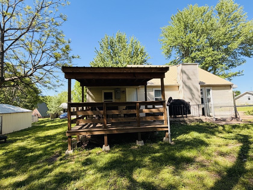 Completely remodeled and move-in ready, this quaint home blends - photo 34