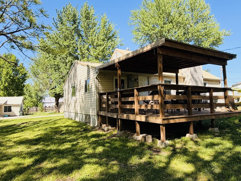 Completely remodeled and move-in ready, this quaint home blends - photo 35