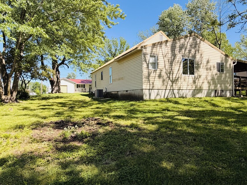 Completely remodeled and move-in ready, this quaint home blends - photo 36