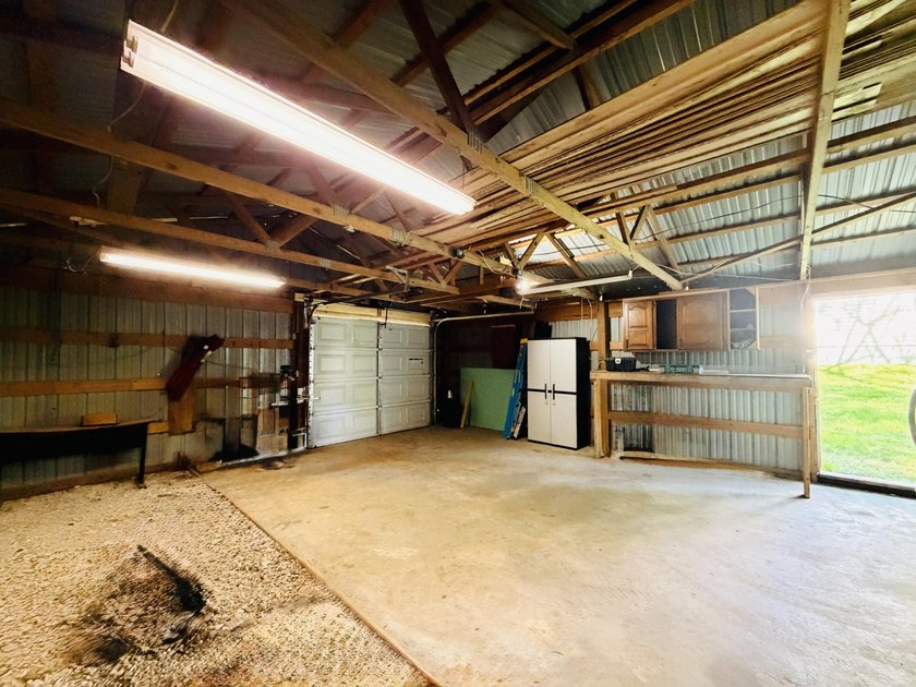 Completely remodeled and move-in ready, this quaint home blends - photo 41