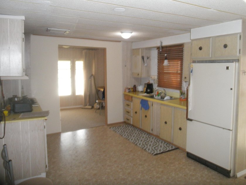 CORNER LOCATED MANUFACTURE HOME WHERE YOU OWN THE LAND AND NO - photo 2