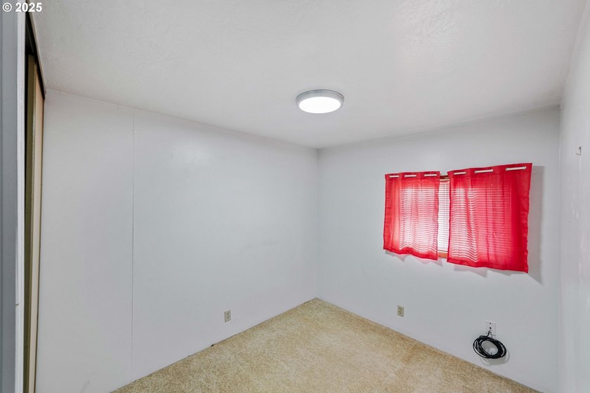 This well cared-for manufactured home in Dunes Mobile offers a - photo 11