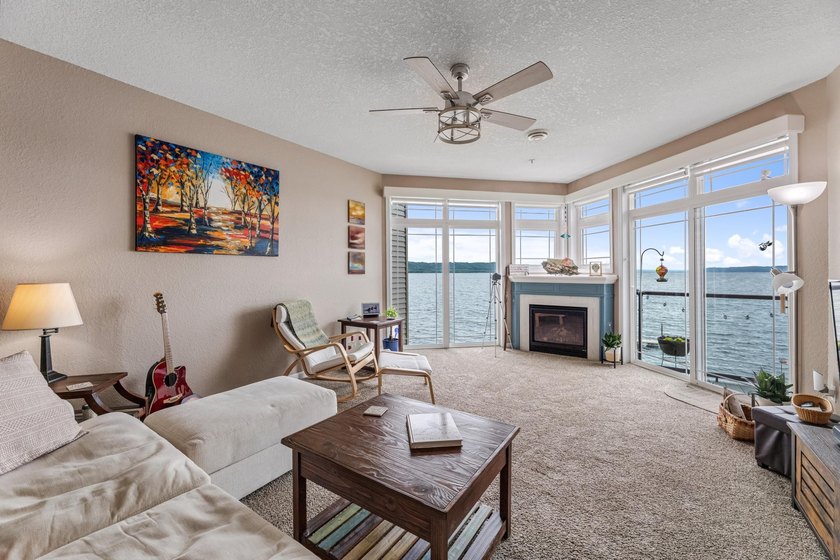 --Enjoy breathtaking views of this rare waterfront lake and - photo 6