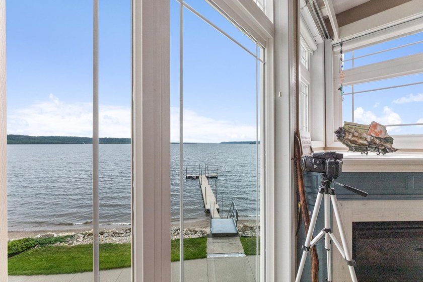 --Enjoy breathtaking views of this rare waterfront lake and - photo 8