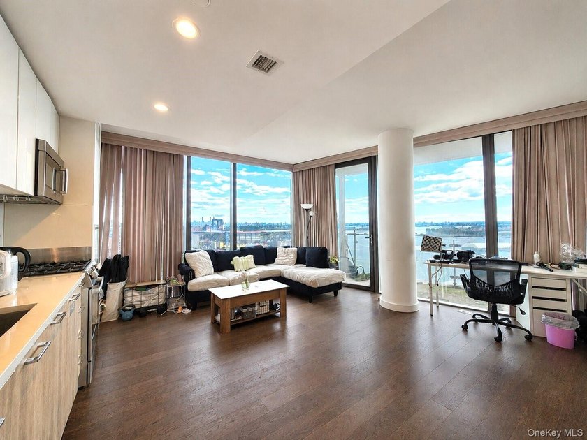 Welcome to Unit 16J at Skyview's Grand One Tower! This rare - photo 2