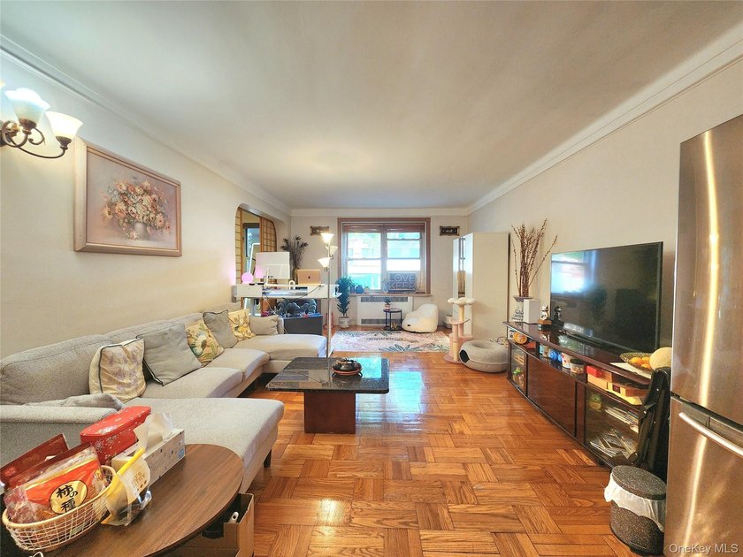 Welcome to unit 1K at 143-07 Sanford Avenue, a well-maintained - photo 2