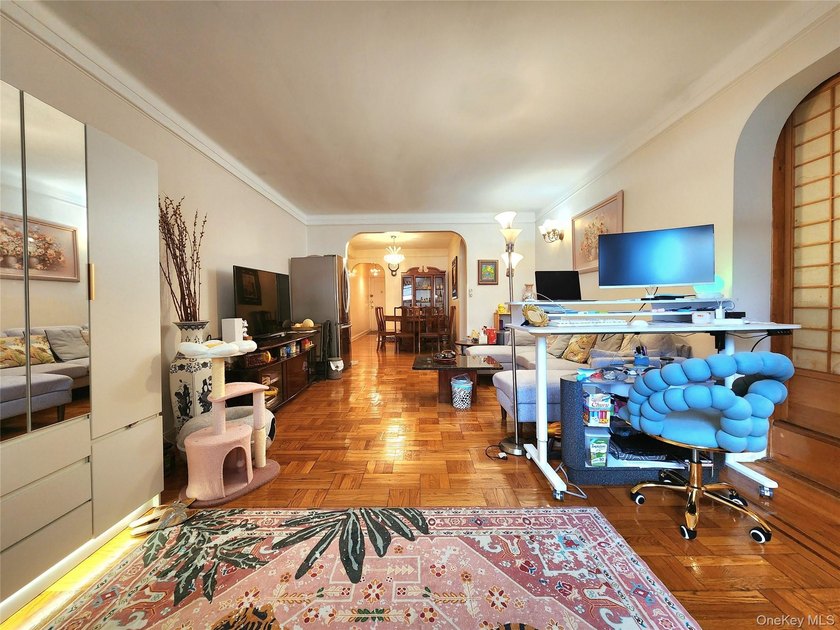 Welcome to unit 1K at 143-07 Sanford Avenue, a well-maintained - photo 4