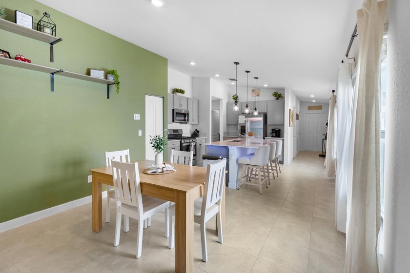 This new single-story home features a smart layout designed for - photo 12