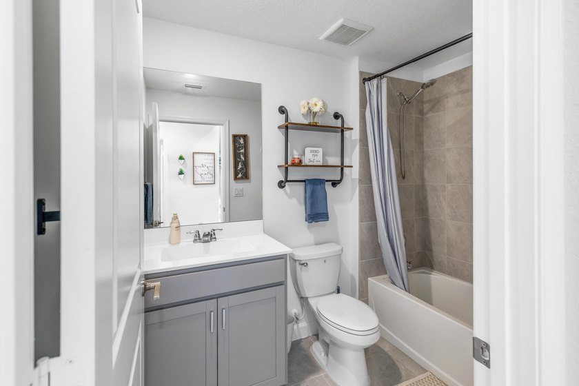 This new single-story home features a smart layout designed for - photo 16