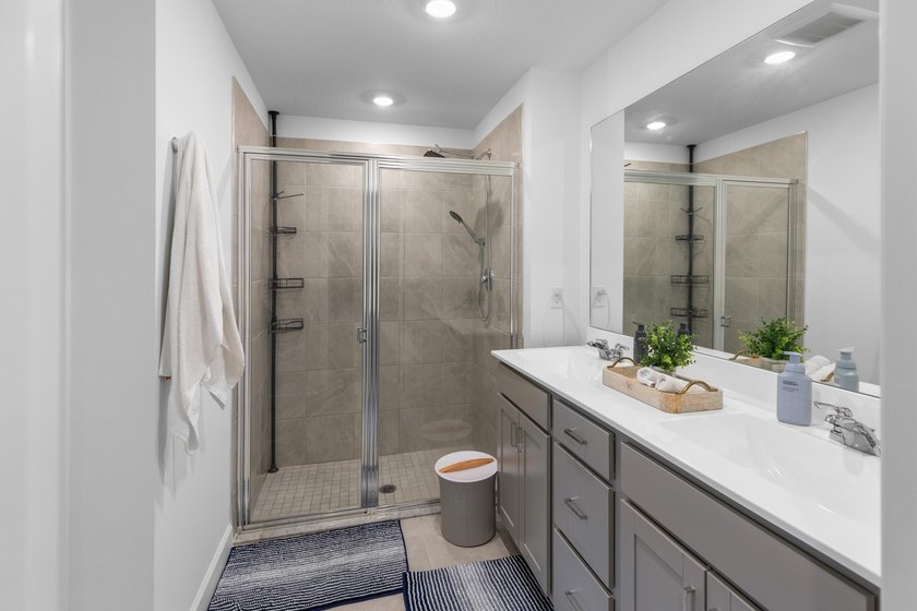 This new single-story home features a smart layout designed for - photo 22