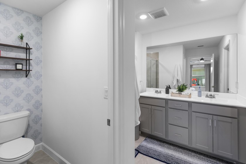 This new single-story home features a smart layout designed for - photo 23