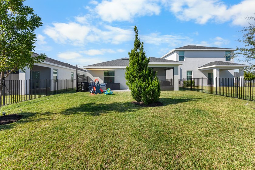 This new single-story home features a smart layout designed for - photo 31