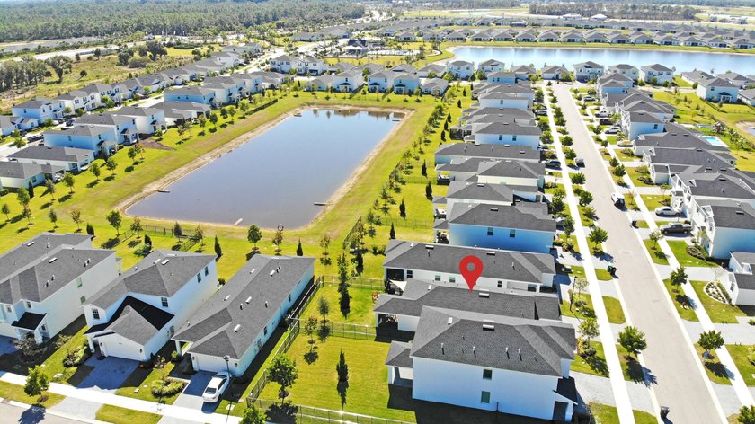This new single-story home features a smart layout designed for - photo 35