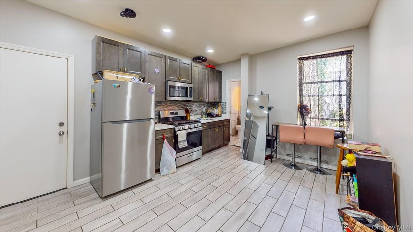 Rare Investment Opportunity - Beautiful Brick Quadruplex. This - photo 3