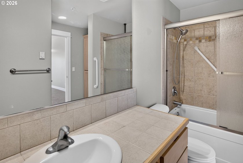 Perched on the third floor, this immaculate 2-bedroom, 2-bath - photo 28