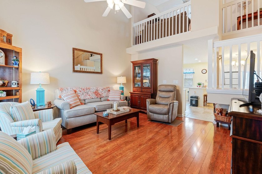Delightful MOVE-IN READY end unit located in the highly - photo 3