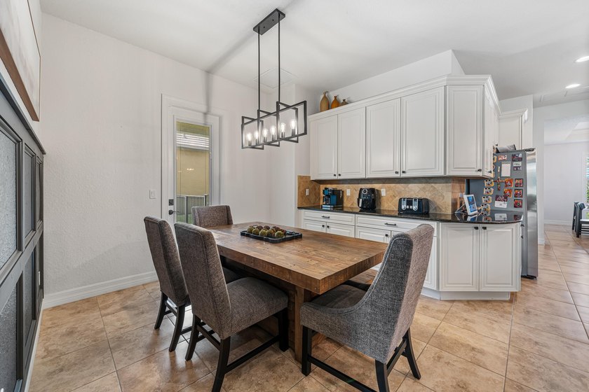 This exceptional 4-bedroom, 3.5-bath home showcases a - photo 17