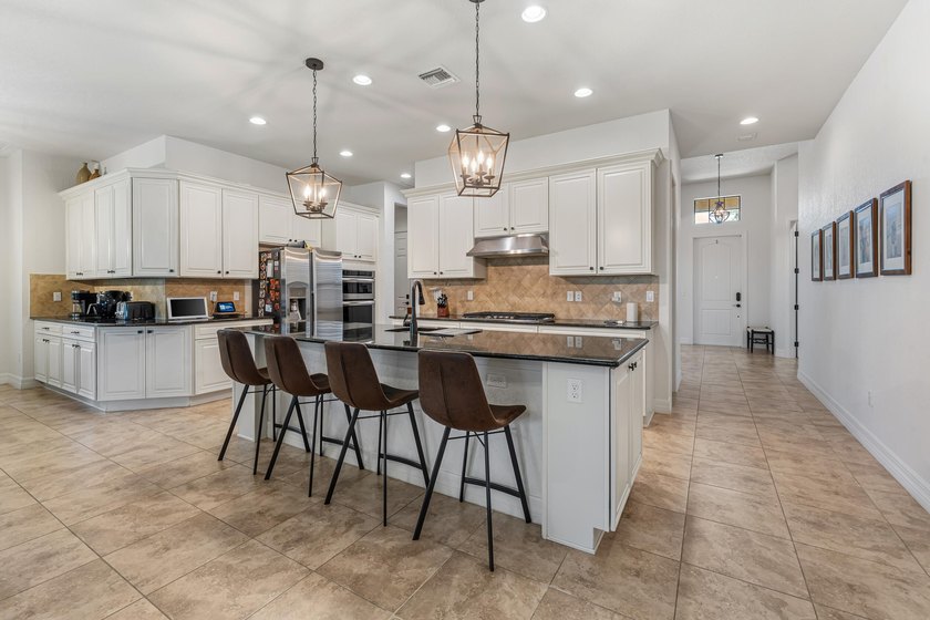 This exceptional 4-bedroom, 3.5-bath home showcases a - photo 18