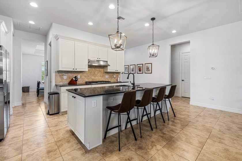 This exceptional 4-bedroom, 3.5-bath home showcases a - photo 20