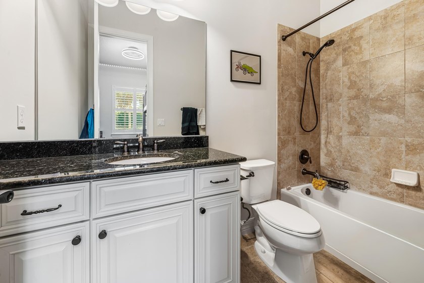 This exceptional 4-bedroom, 3.5-bath home showcases a - photo 23