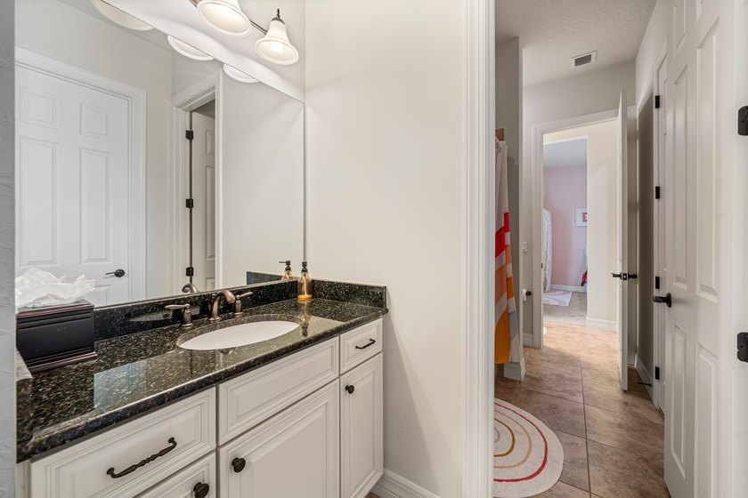 This exceptional 4-bedroom, 3.5-bath home showcases a - photo 36