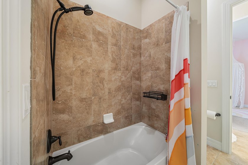This exceptional 4-bedroom, 3.5-bath home showcases a - photo 37