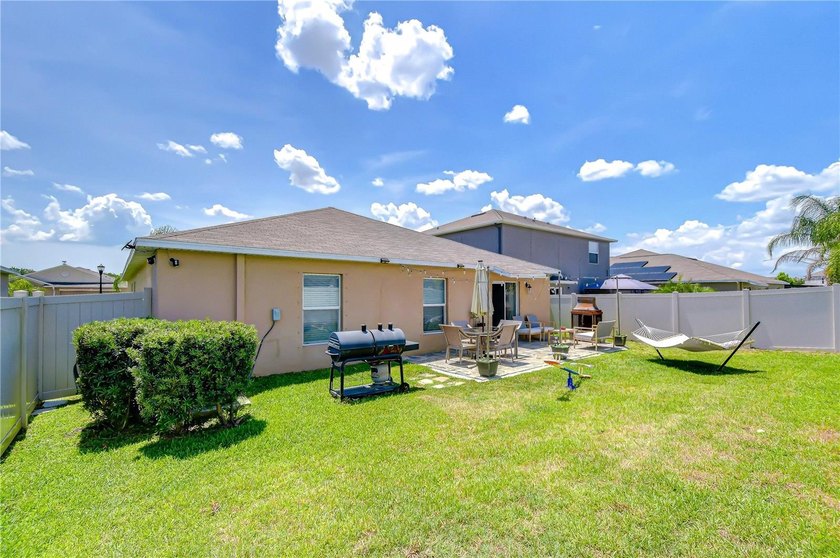 Welcome to this beautifully designed 4-bedroom, 2-bathroom split - photo 36