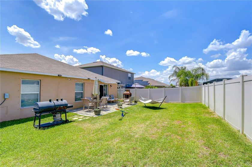 Welcome to this beautifully designed 4-bedroom, 2-bathroom split - photo 37