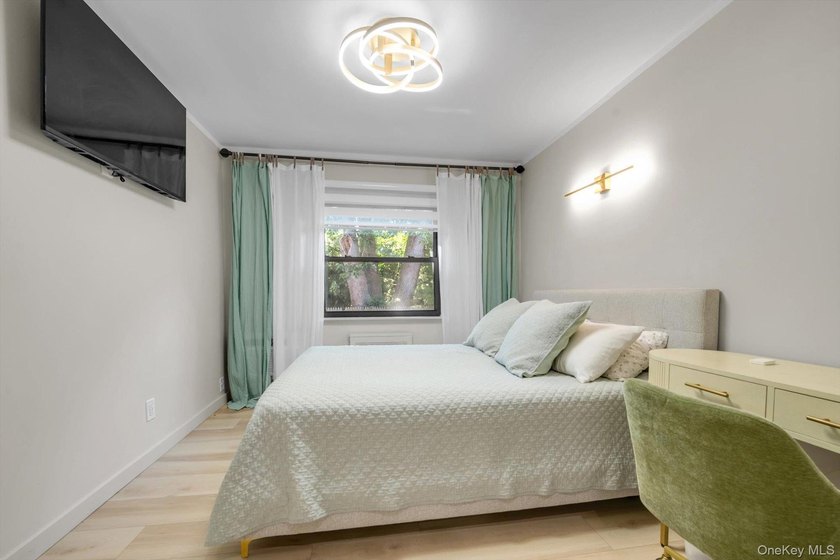 Lovely 2 Bedroom, 1 Bath First Floor Coop Apt in the Beautiful - photo 9