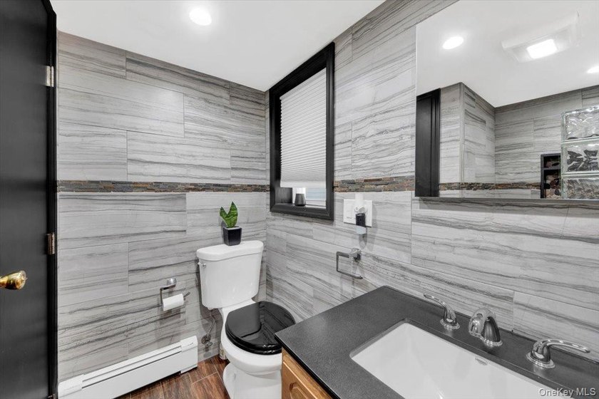 Welcome to 6 Edgewater Park, a beautifully maintained 3-bedroom - photo 12