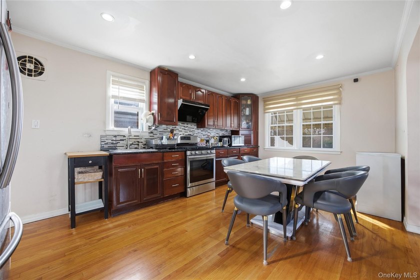 Nestled In a Prime Bayside Location, This Well-Appointed - photo 5