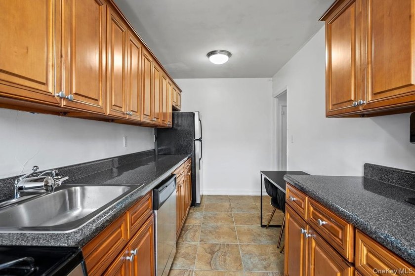 Fabulous top floor 2 bedroom unit close to the new bustling - photo 11